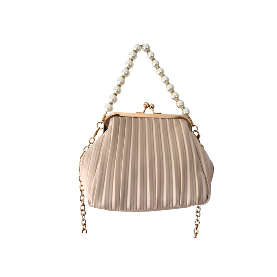 Beige pleated handbag with pearl handle and chain strap on a white background