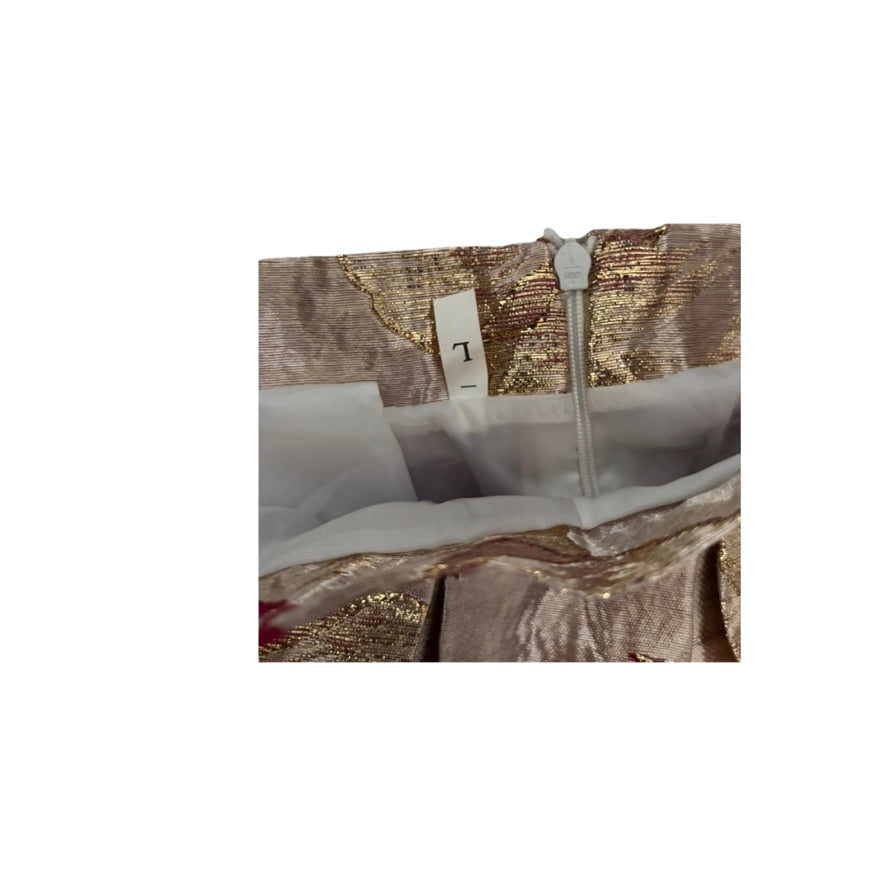 Close-up of a patterned fabric with a zipper and label on a white background