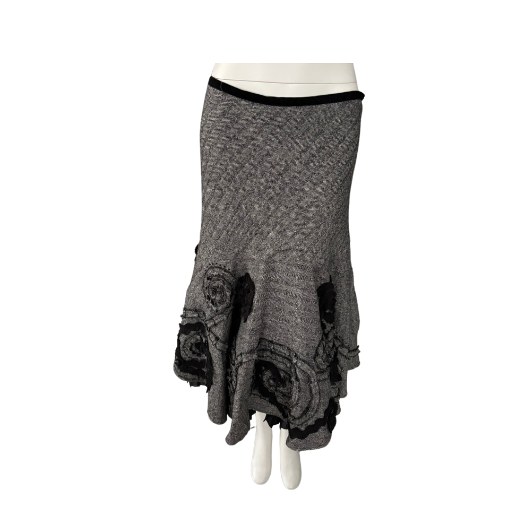 Gray skirt with decorative elements on a white background