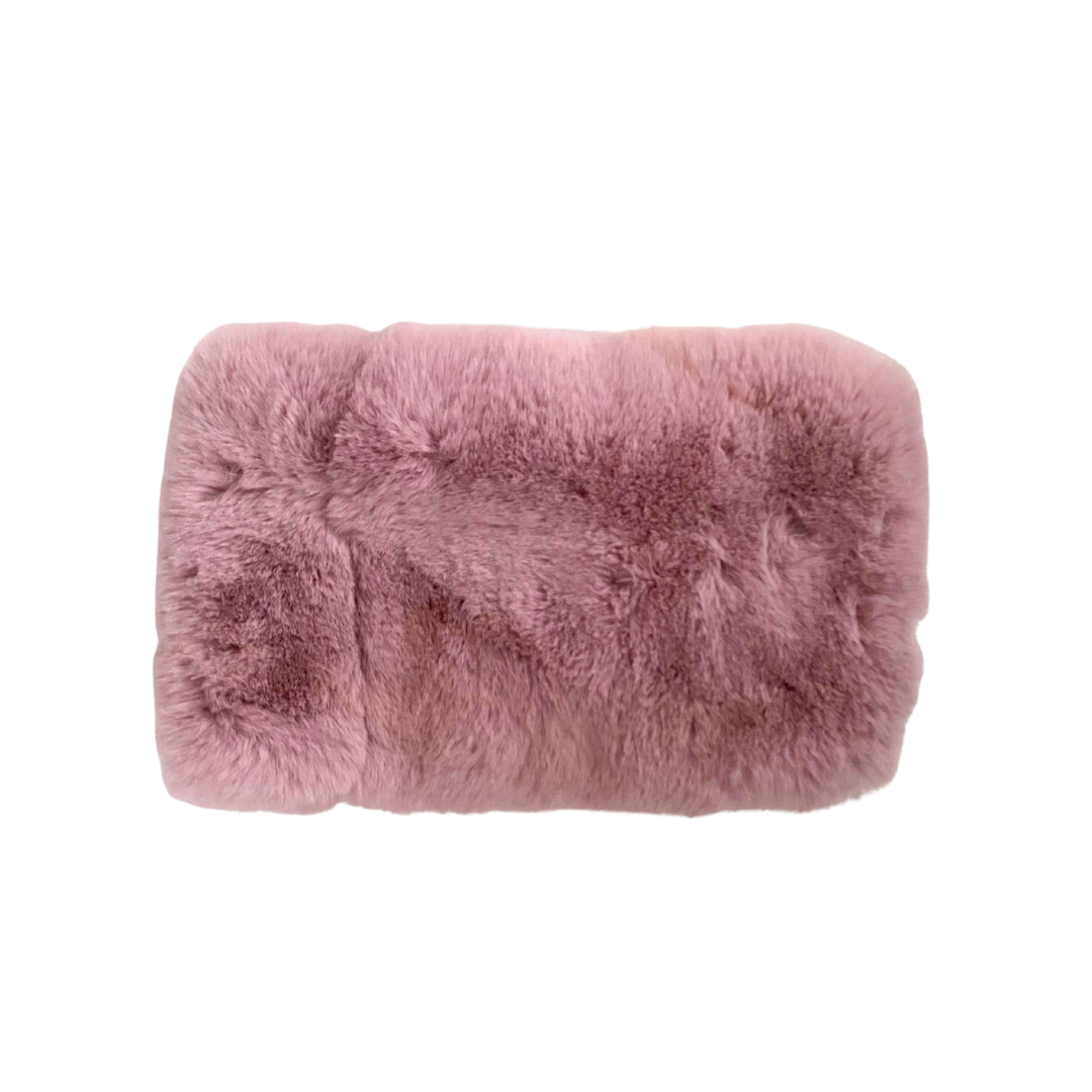 Pink fluffy neck stole on a white background