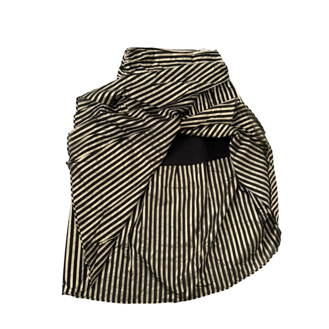 Black and white striped fabric folded into a compact shape on a white background