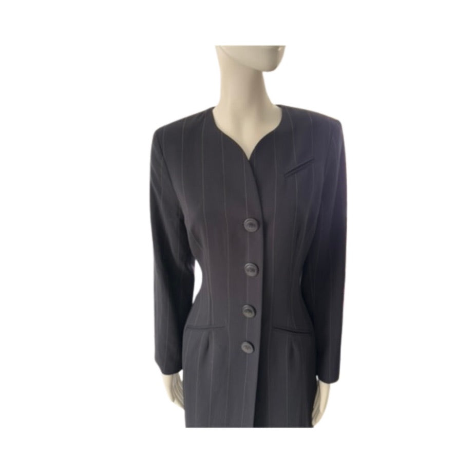 black suit jacket with buttons on a mannequin against a white background