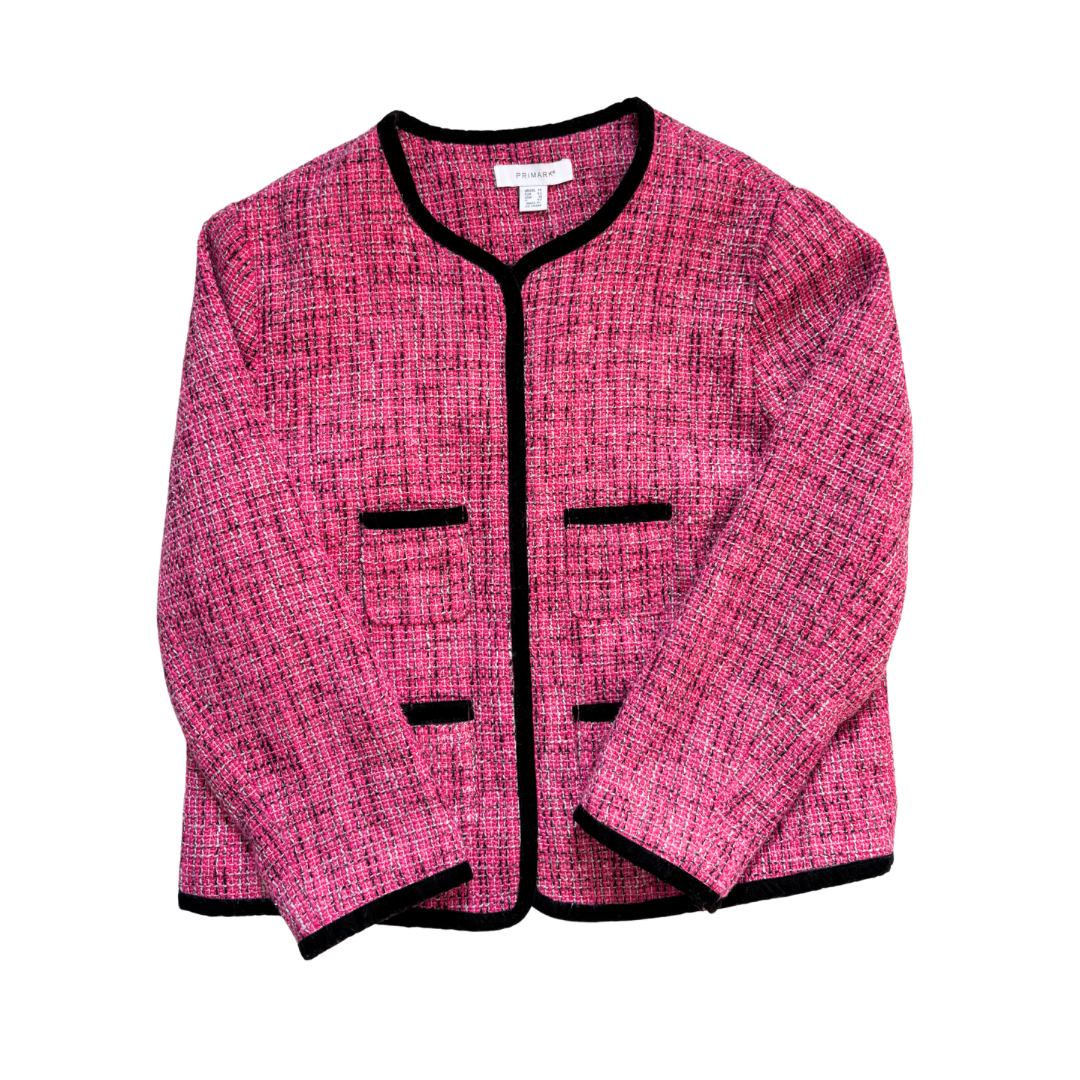 Pink textured jacket with black trim on a white background