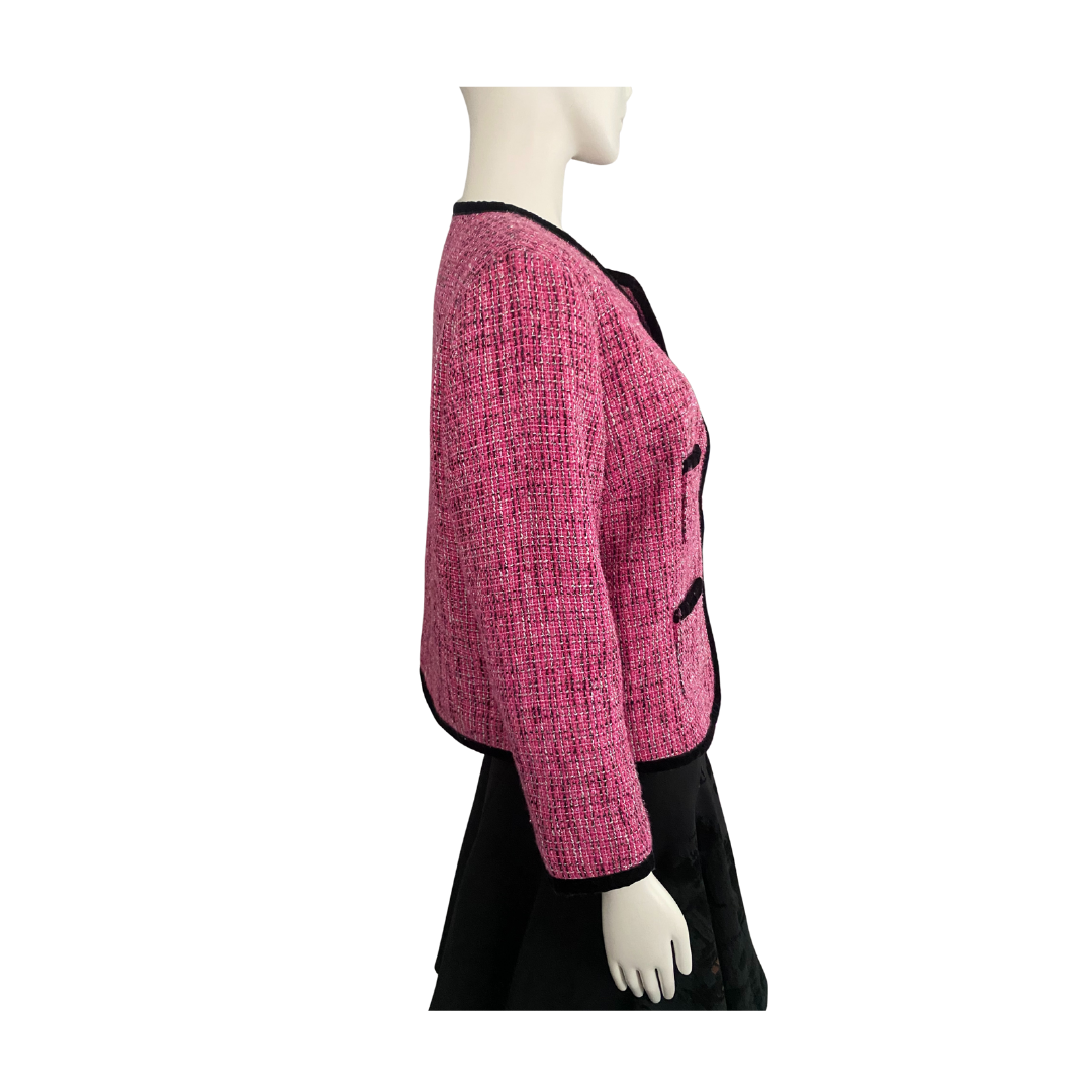 Mannequin wearing a pink textured jacket on a white background