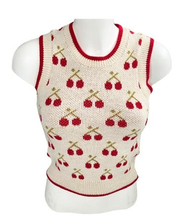 Knitted sleeveless sweater with cherry pattern on a mannequin against a white background
