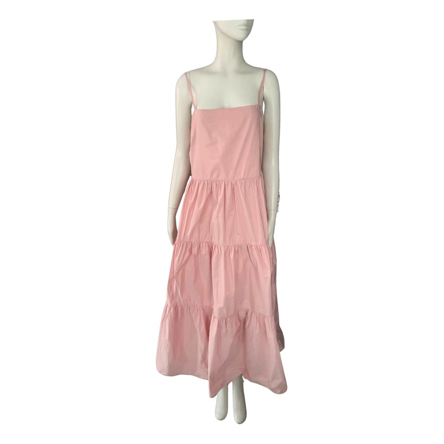 Mannequin wearing a pink dress on a white background