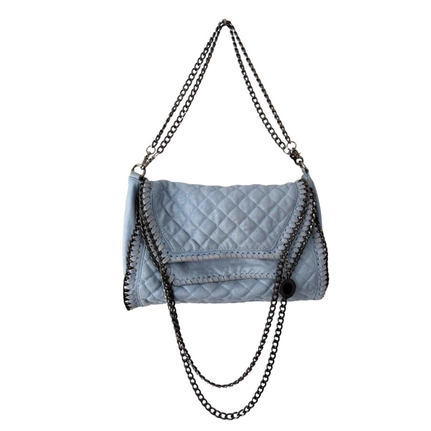 Quilted handbag with chain detail on a white background