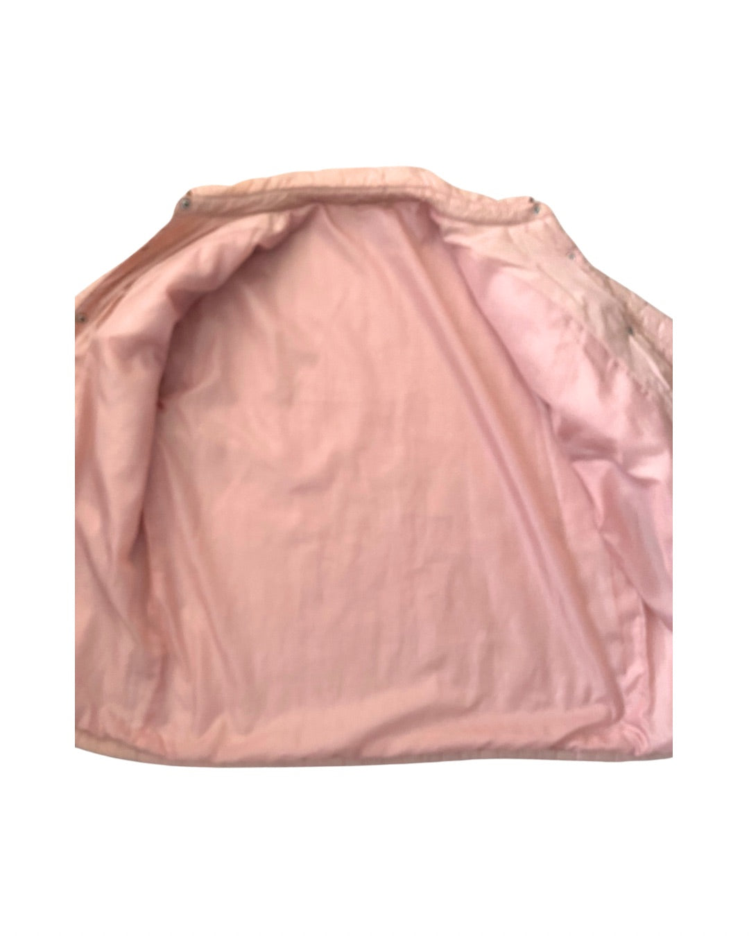 Pink lining top on a white background