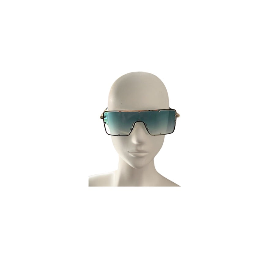 Sunglasses on a mannequin head against a white background