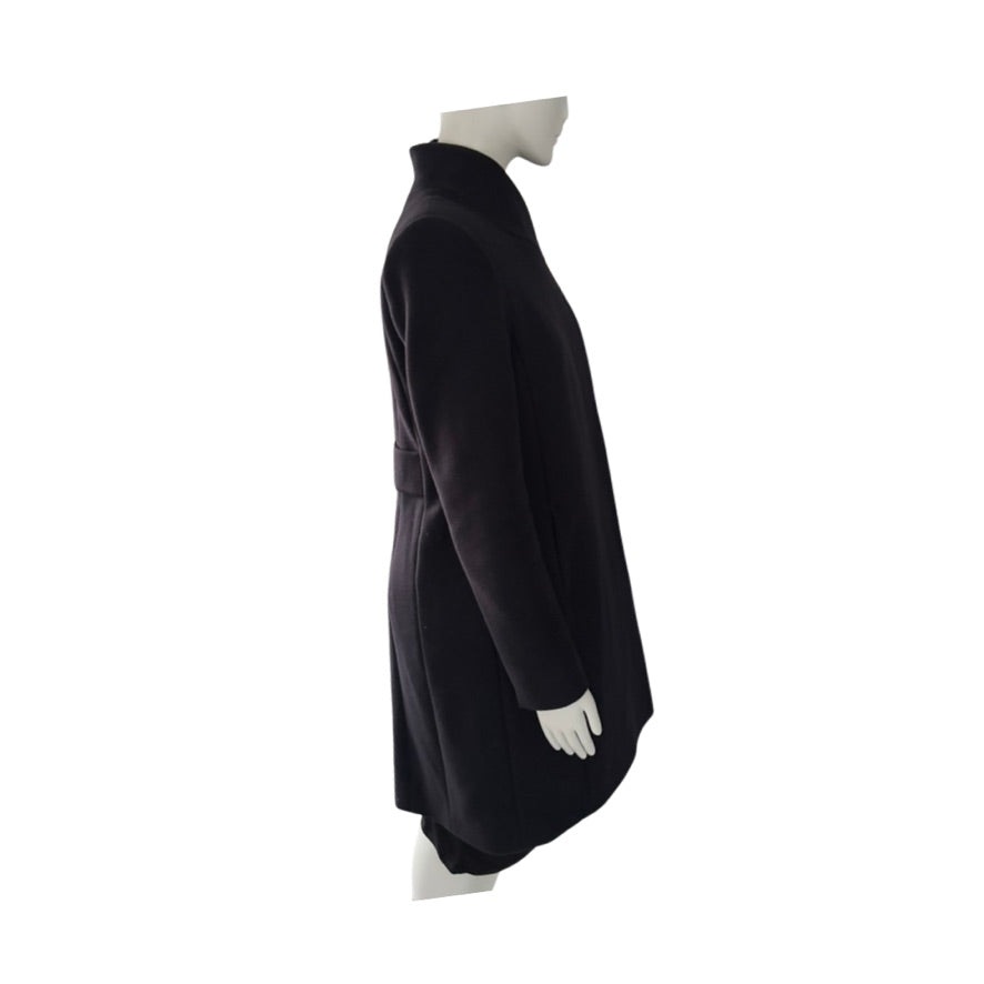 Navy coat on a mannequin against a white background