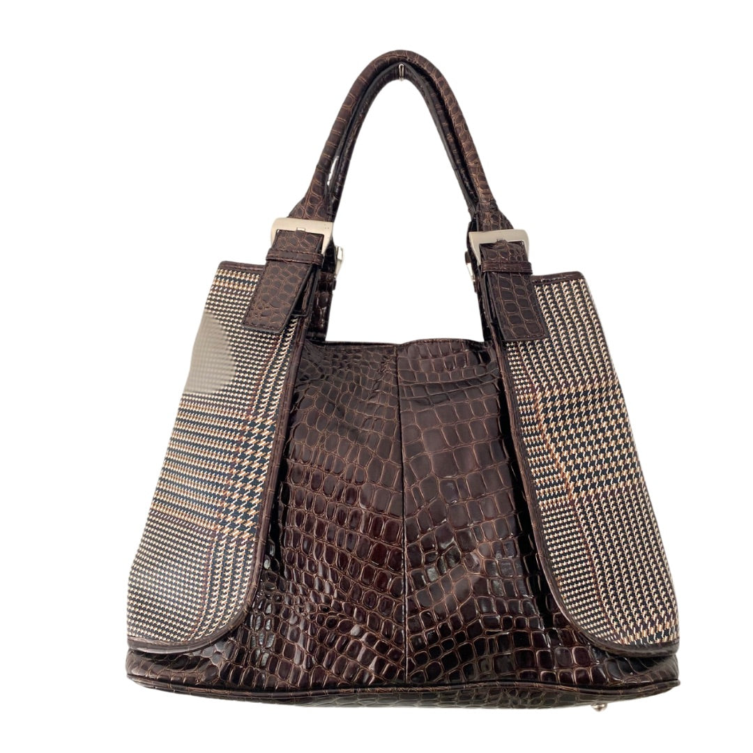 A brown faux snakeskin pattern shoulder bag with check panel design, silver tone hardware, and a buckle handle detail.