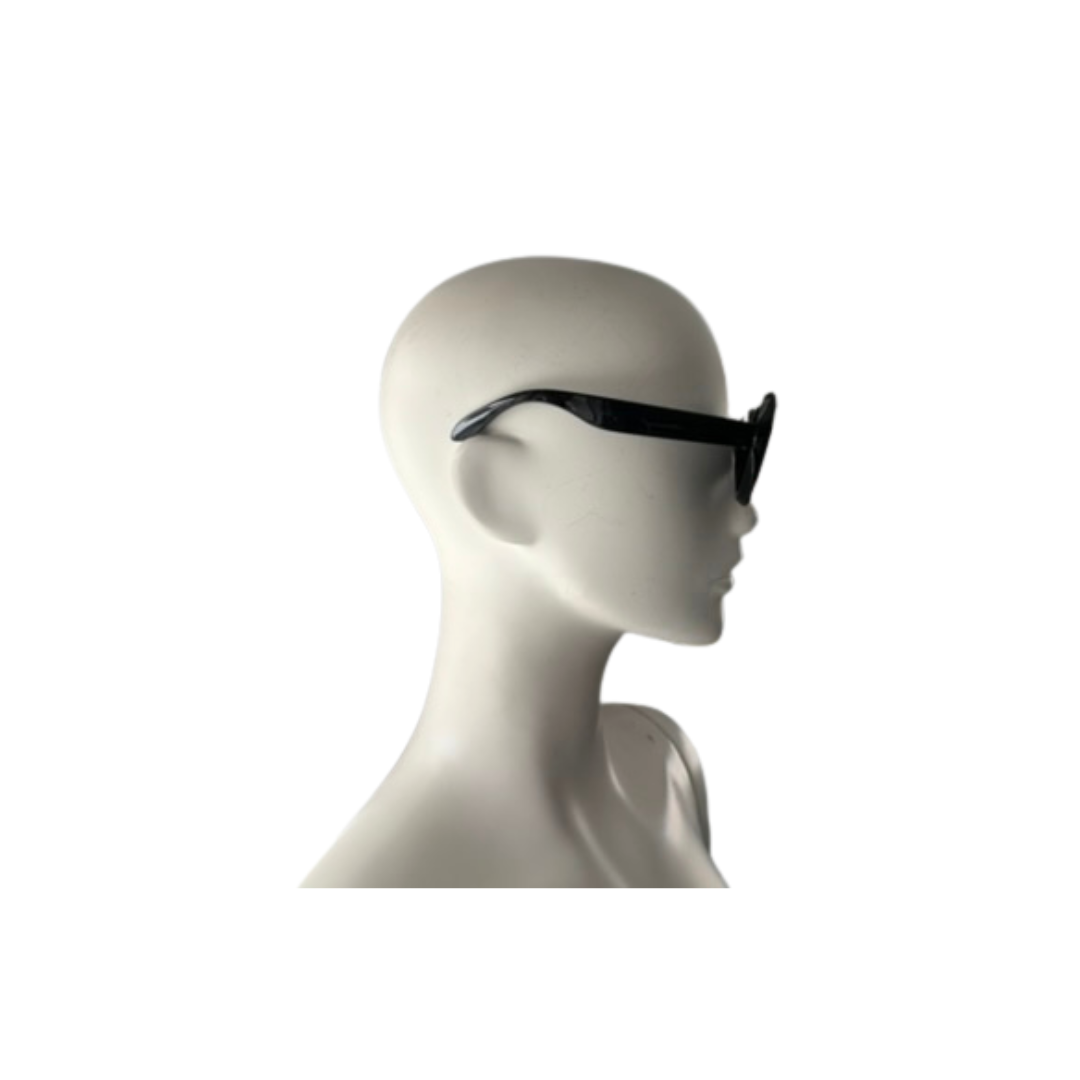Black sunglasses on a mannequin head against a white background