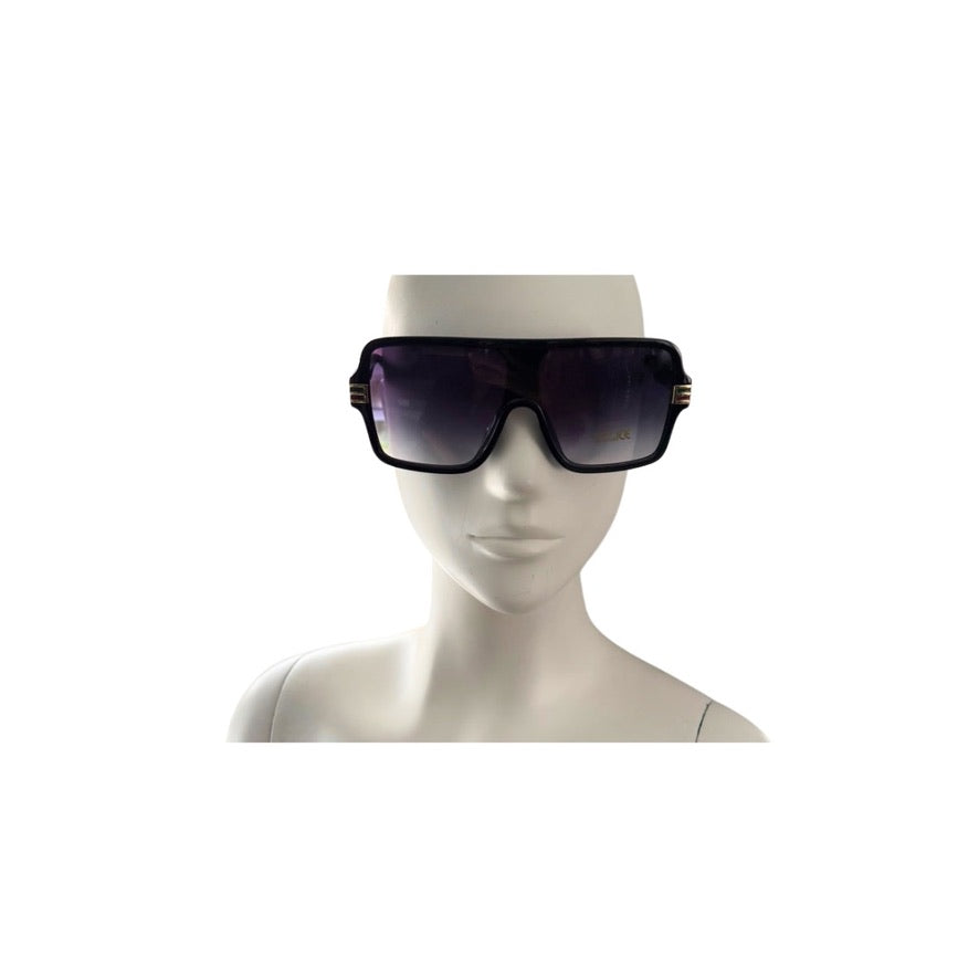 Sunglasses on a mannequin head against a white background