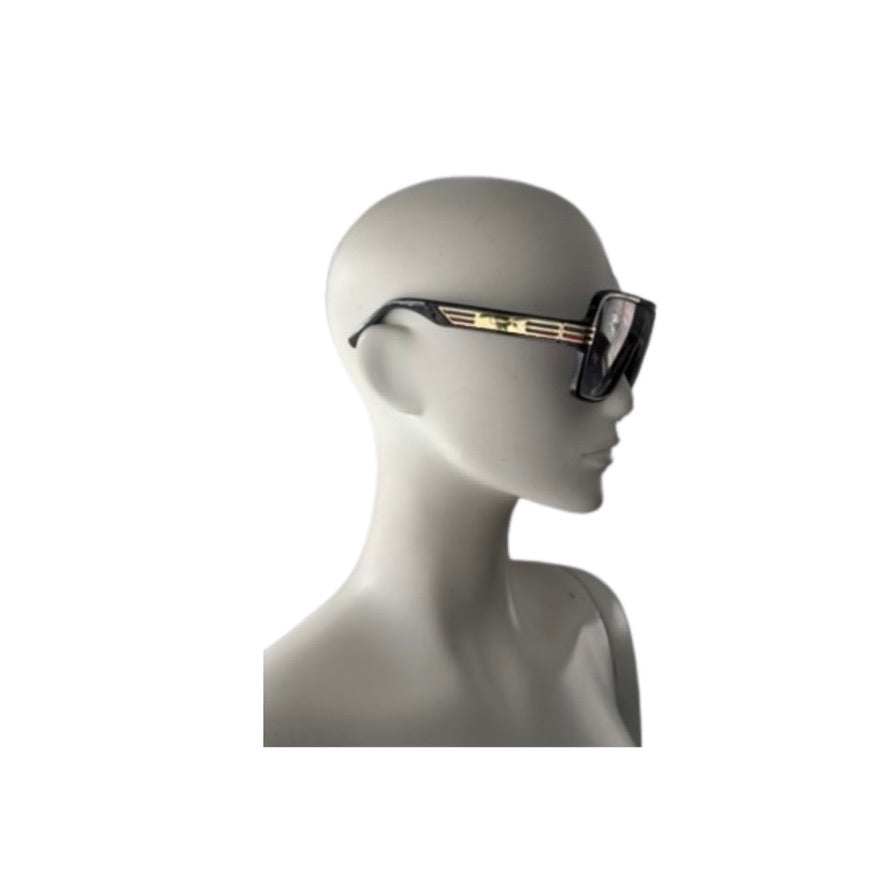 Sunglasses on a mannequin head against a white background