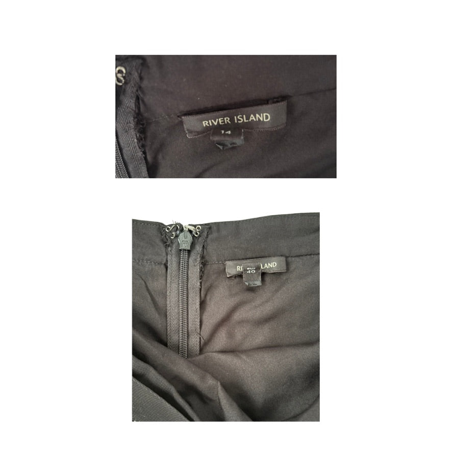 Close-up of a gray jacket with 'River Island' and 'Land' labels on a white background