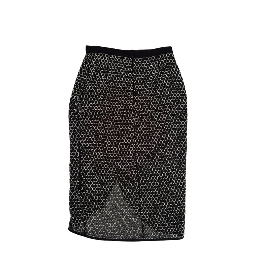 Black honeycomb patterned skirt on a white background