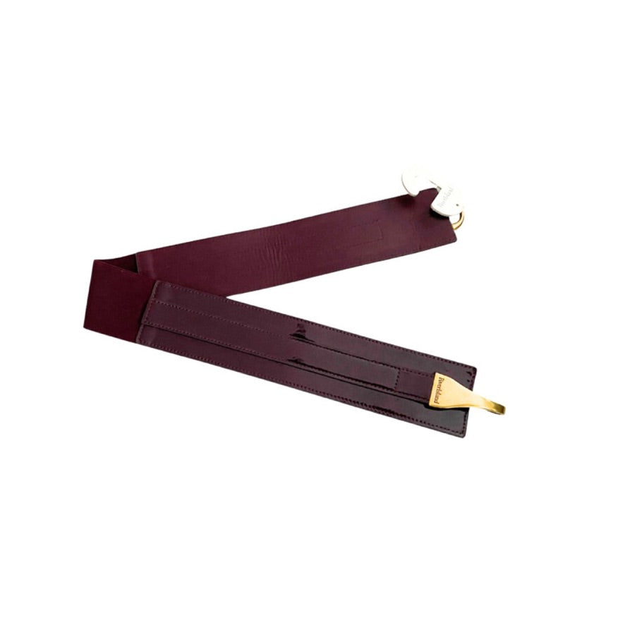 Maroon belt with gold buckle on a white background