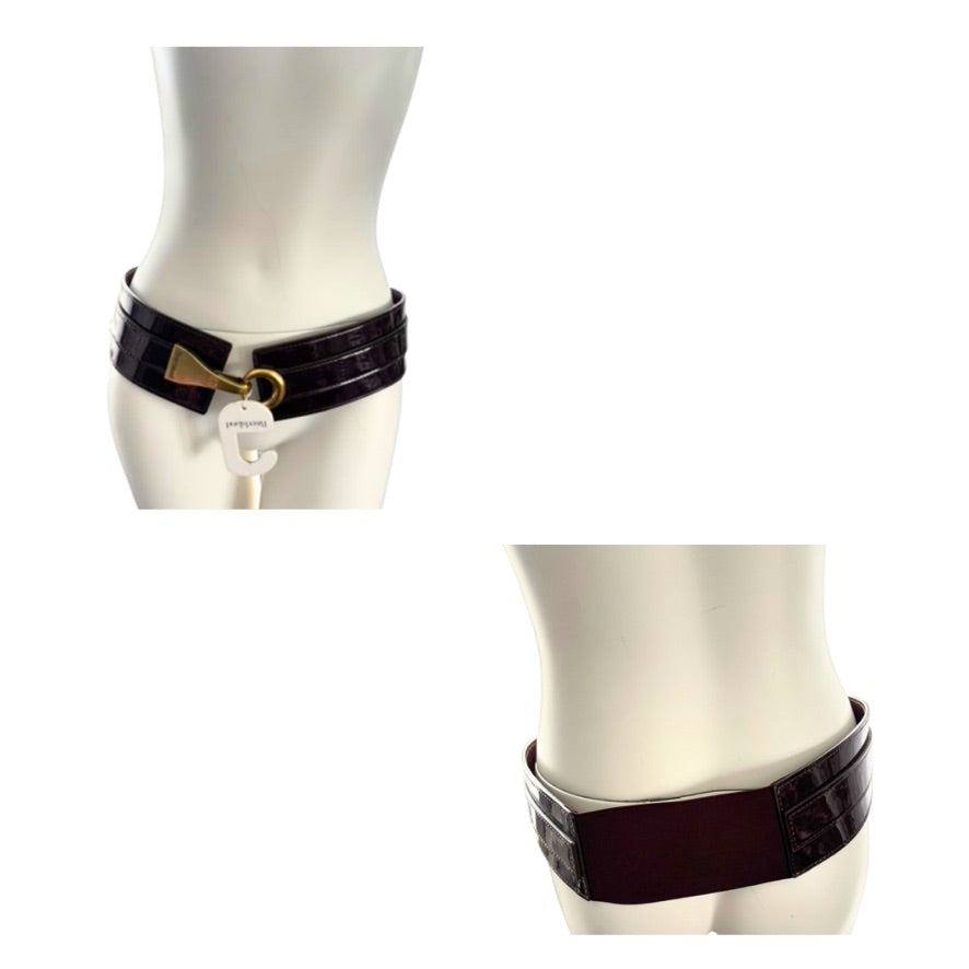 Two burgundy leather belts with metal buckles on a white background