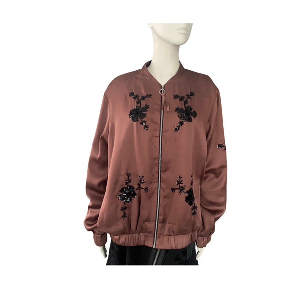 Brown jacket with black floral embroidery on a mannequin against a white background