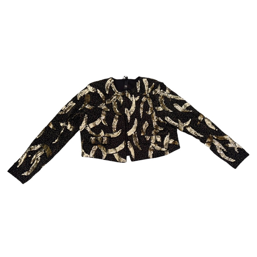 Black sweater with gold abstract pattern on a white background