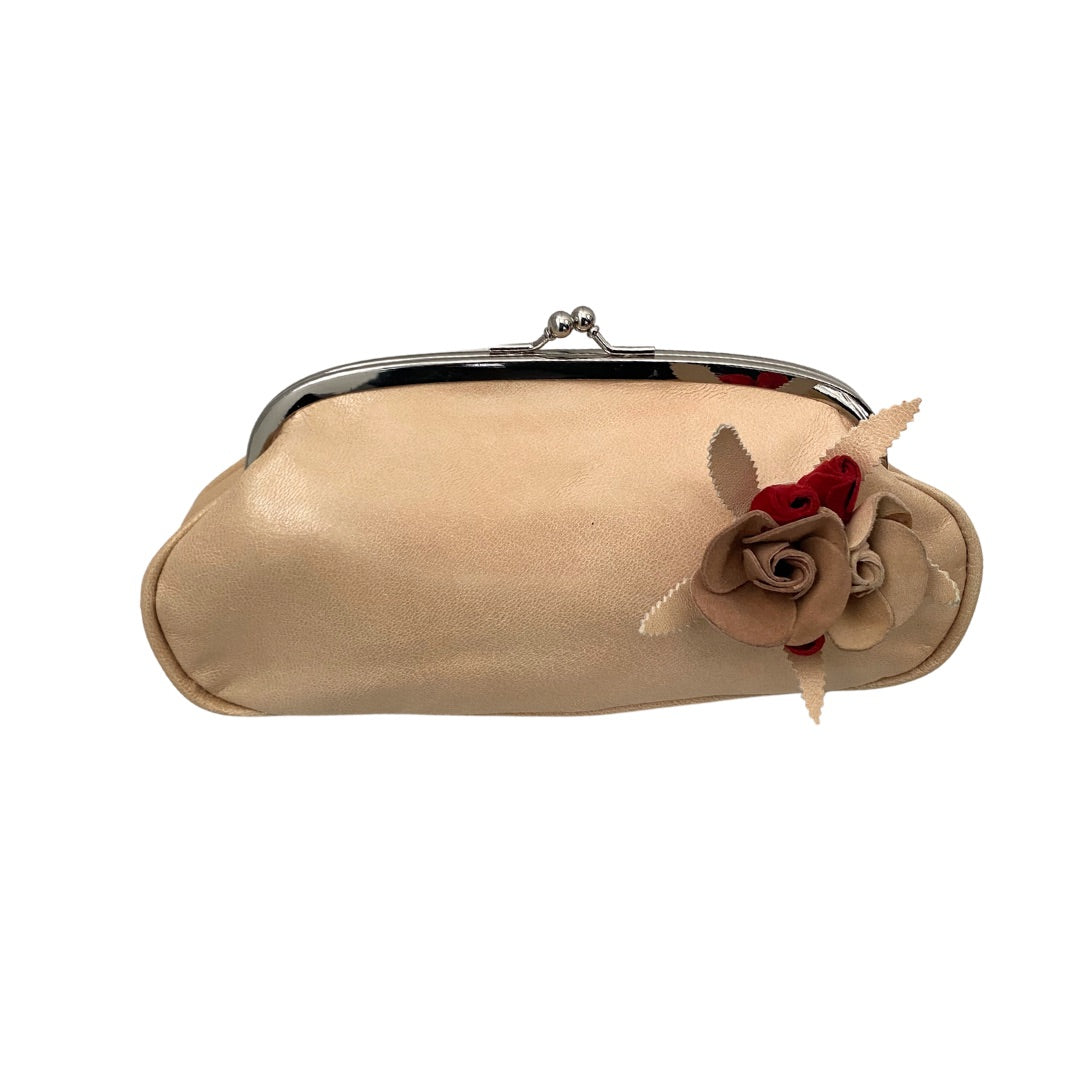 A vintage cream and red faux leather clutch bag with a large appliqué rose detail and clip fastening.