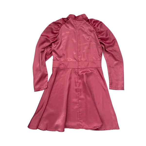 Pink dress with long sleeves on a white background