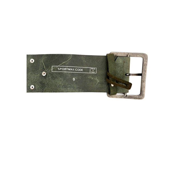 Green belt with silver buckle on a white background