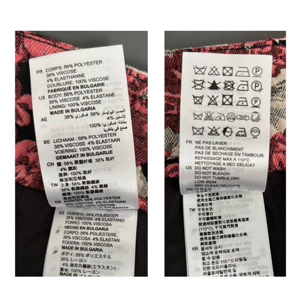 Clothing labels with text and symbols on a fabric background