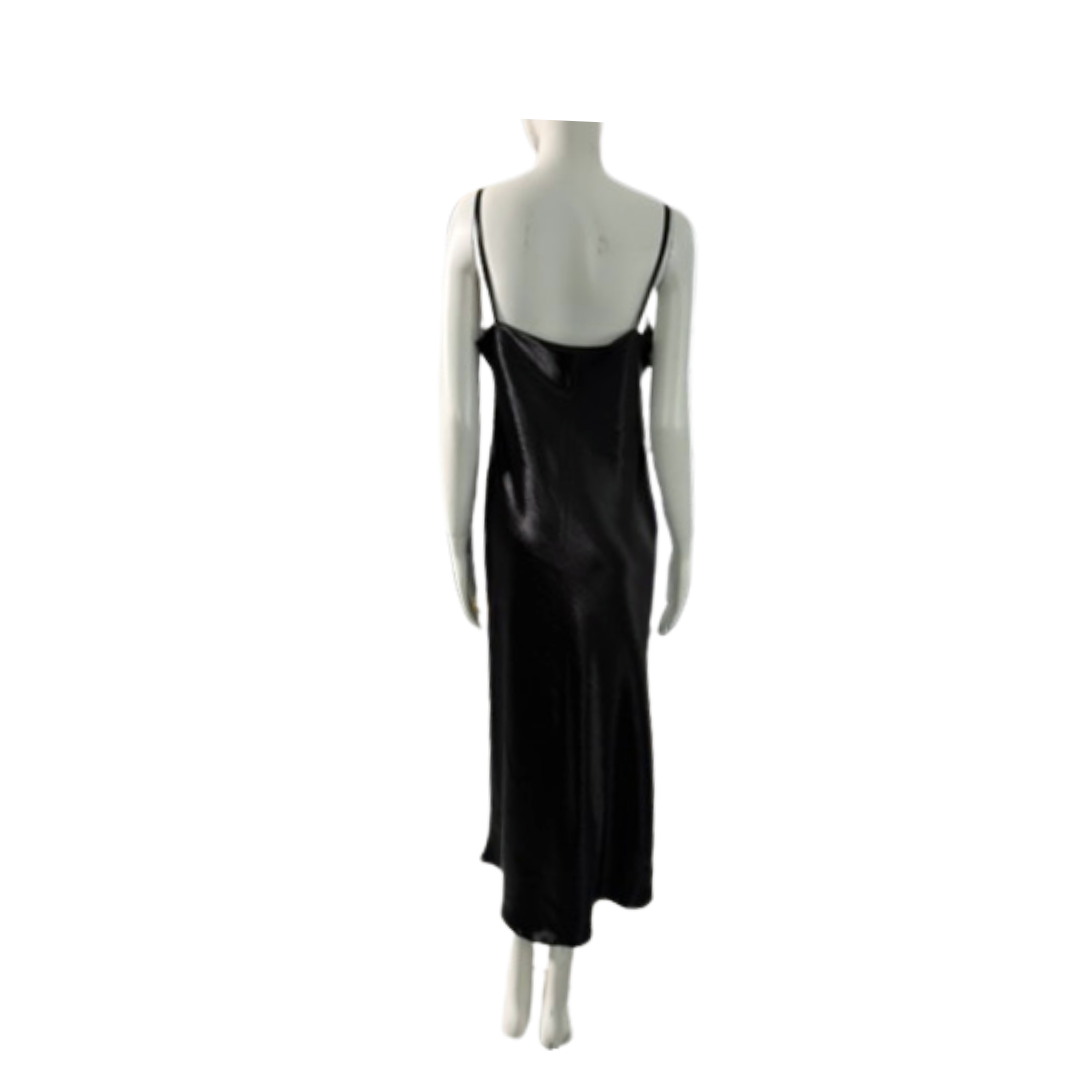 Black slip dress on a mannequin against a white background