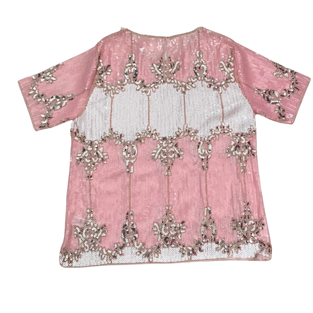 Pink top with silver embellishments on a white background