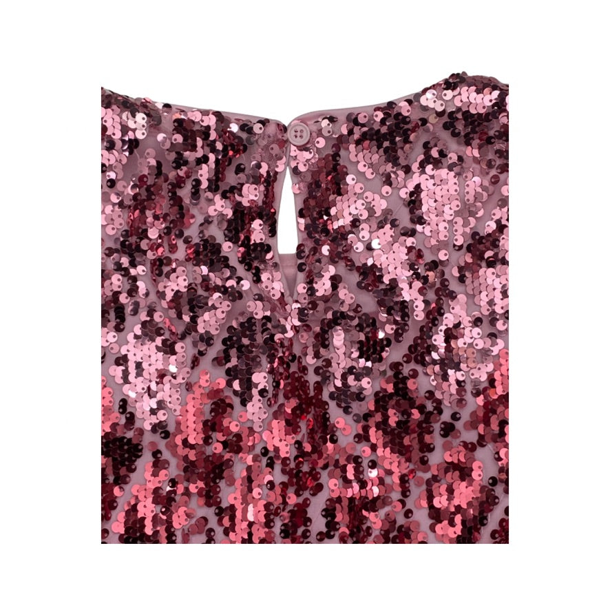 Pink sequin fabric on a white background