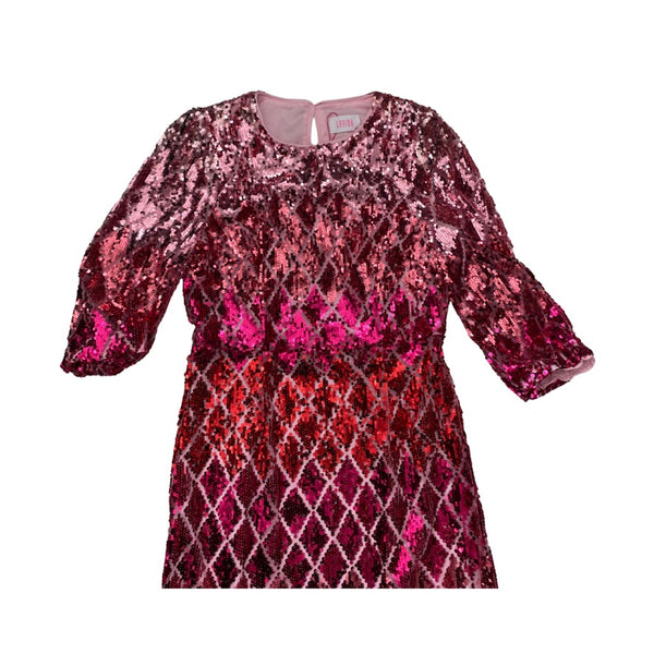 Pink sequin dress on a white background