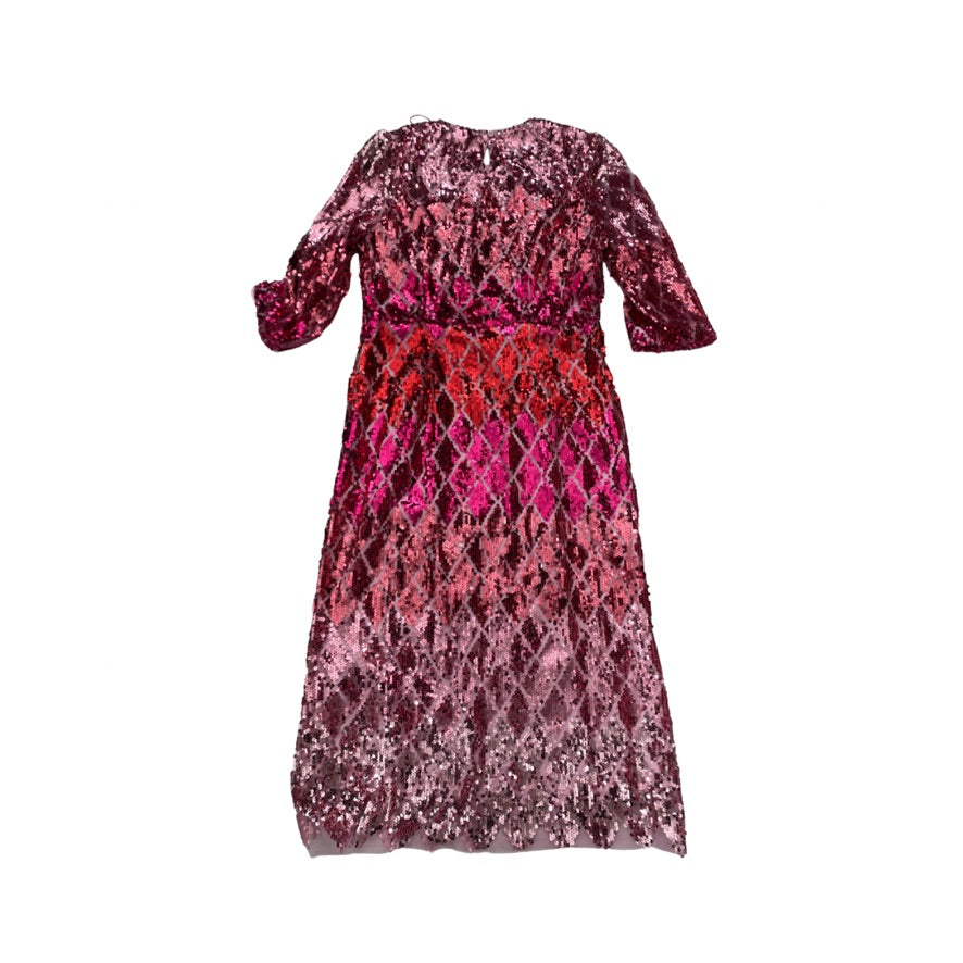 Pink and red patterned dress on a white background