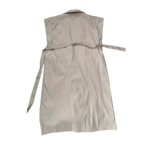 Beige sleeveless dress with a belt on a white background