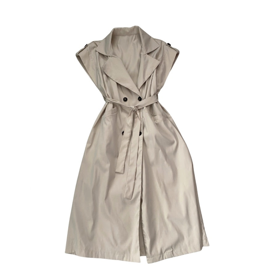 Beige sleeveless trench coat on a white background