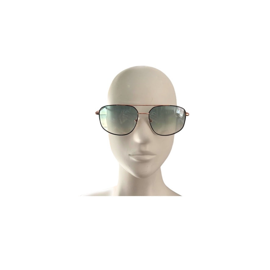 Sunglasses on a mannequin head against a white background
