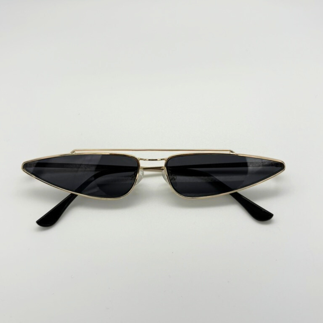 Gold-framed sunglasses with black lenses on a white background