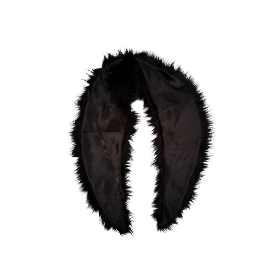 Black fur scarf on a white background