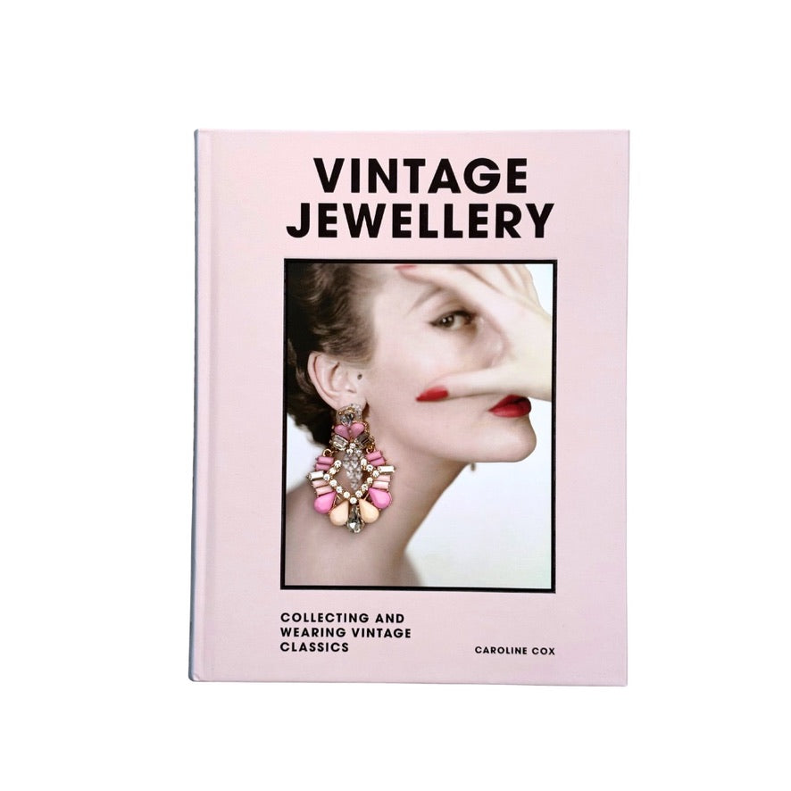 Book titled 'Vintage Jewellery' with a cover featuring an earring and a woman's face on a pink background.