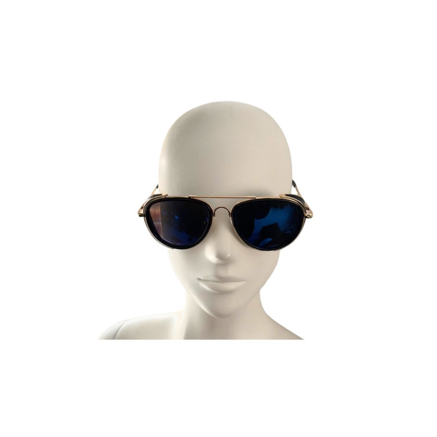Sunglasses on a mannequin head against a white background