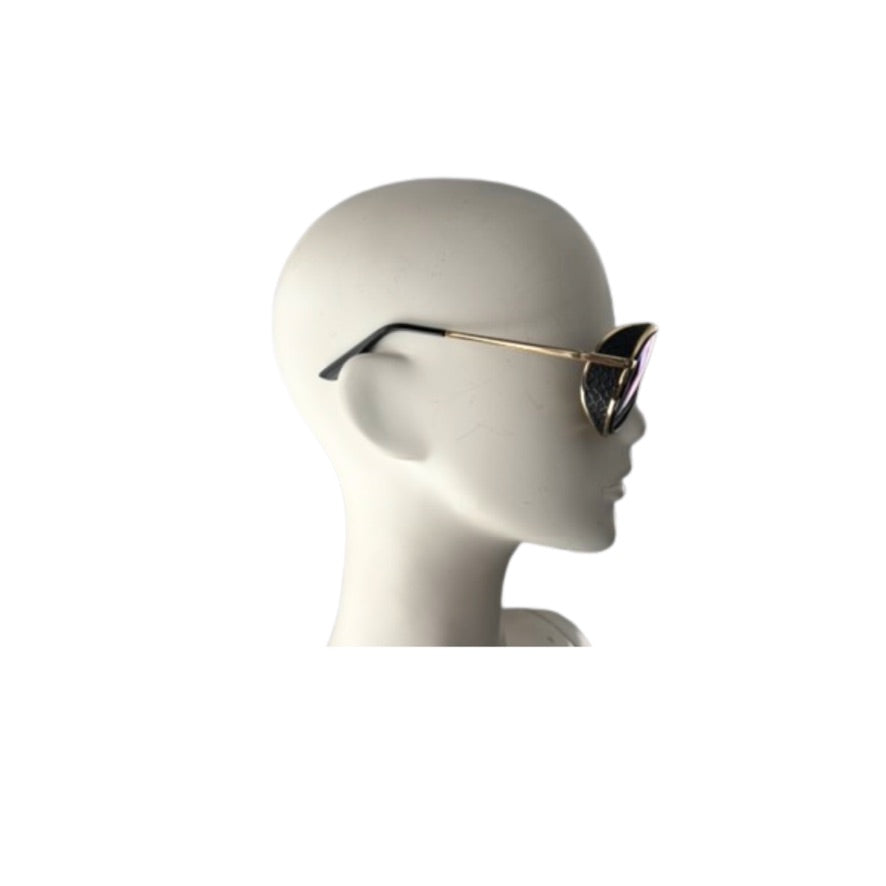 Sunglasses on a mannequin head against a white background