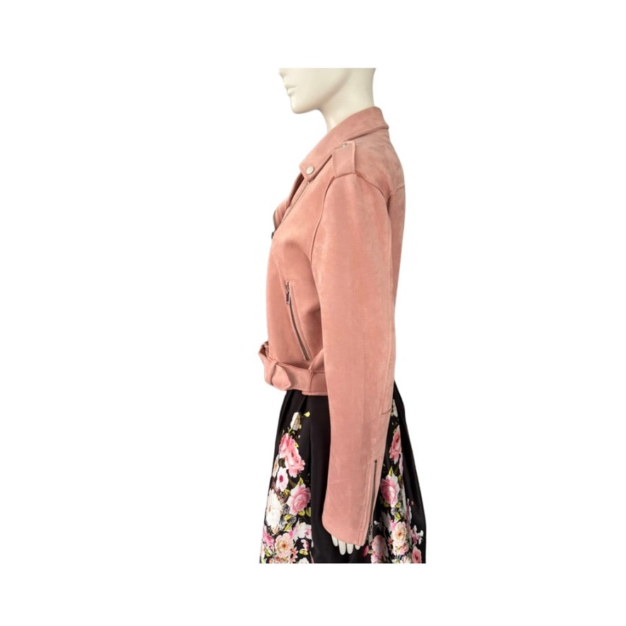 Mannequin wearing a pink jacket and floral skirt on a white background