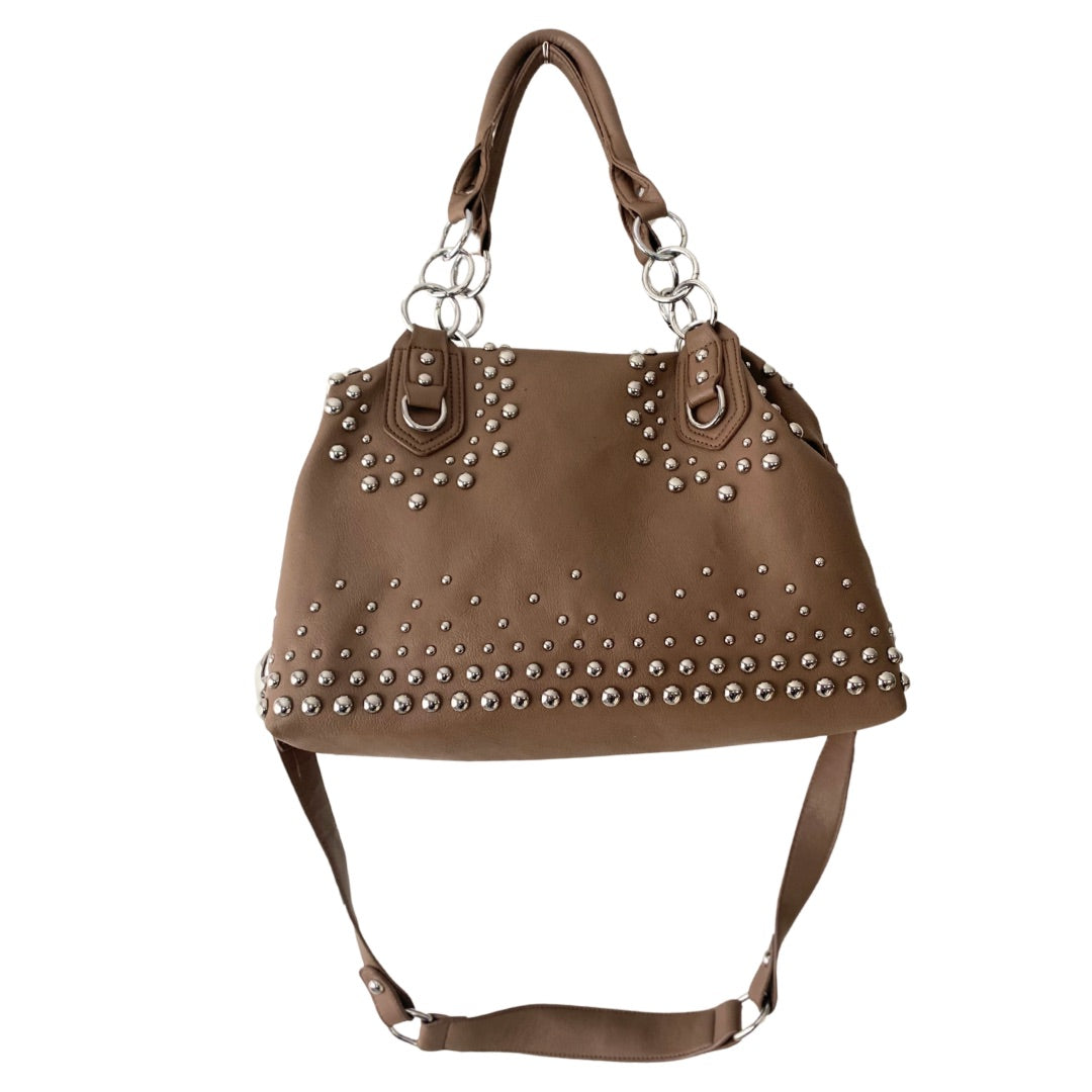 A brown shoulder bag with metallic studs, double top handles with chain accents, and an adjustable shoulder strap.