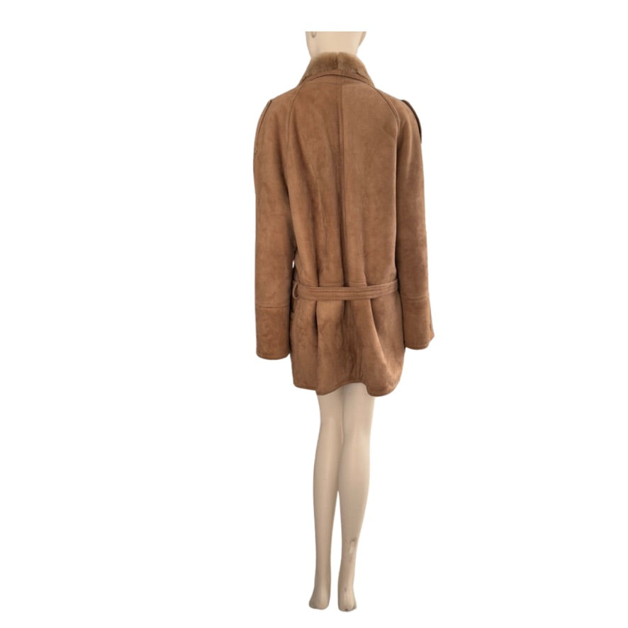 Brown suede jacket on a mannequin against a white background