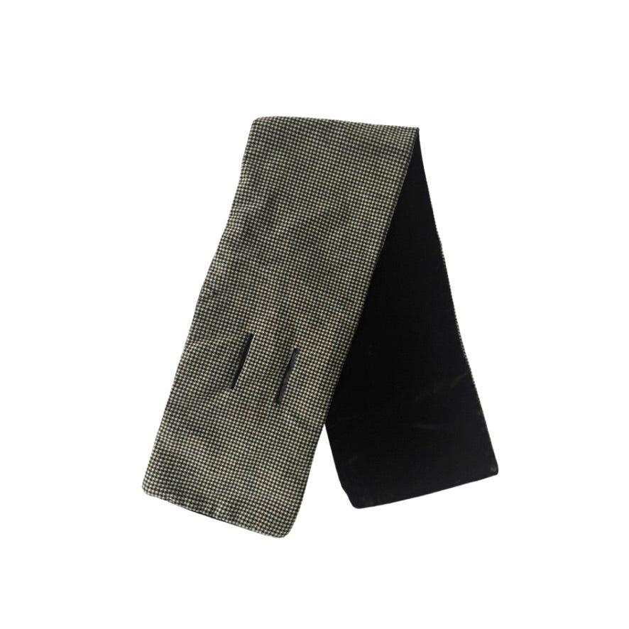 Folded checkered scarf on a white background