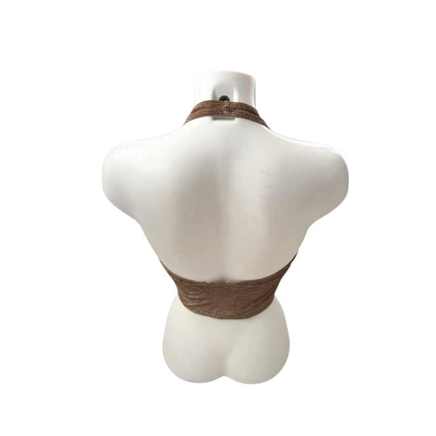 Mannequin wearing a brown leather top on a white background