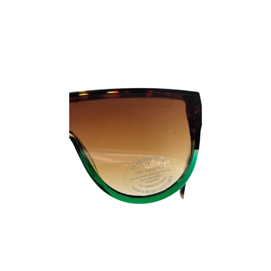 Sunglasses with a reflective lens on a white background