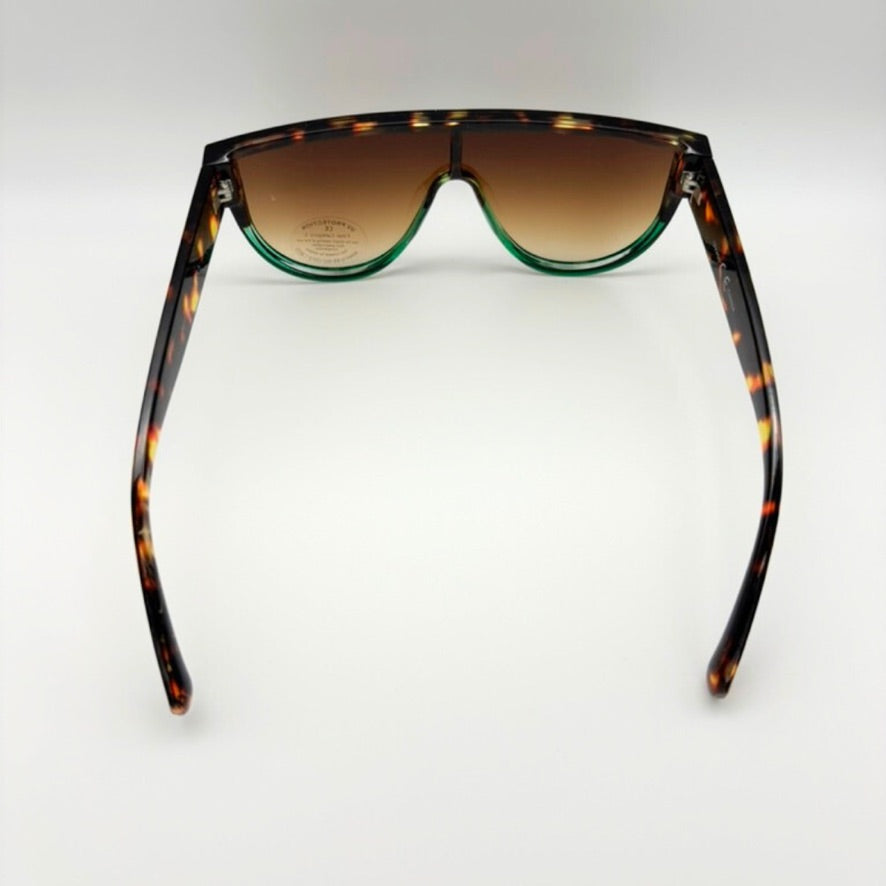 Sunglasses with tortoiseshell frame and brown gradient lenses on a white background