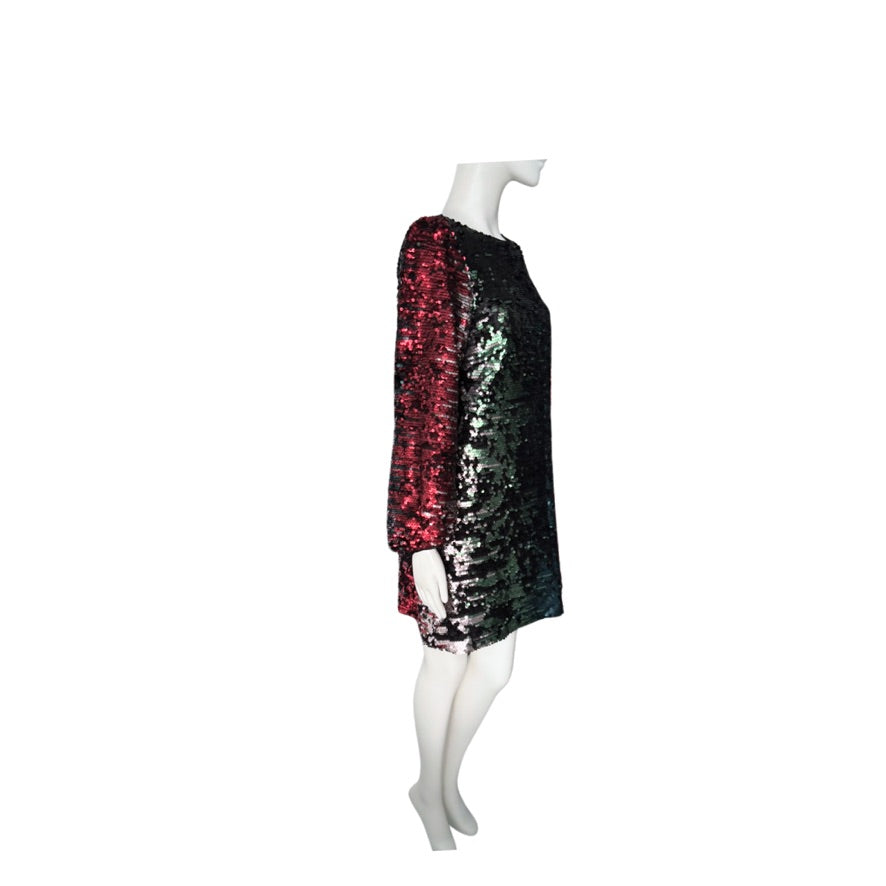Mannequin wearing a sequined dress with a gradient of red to black on a white background