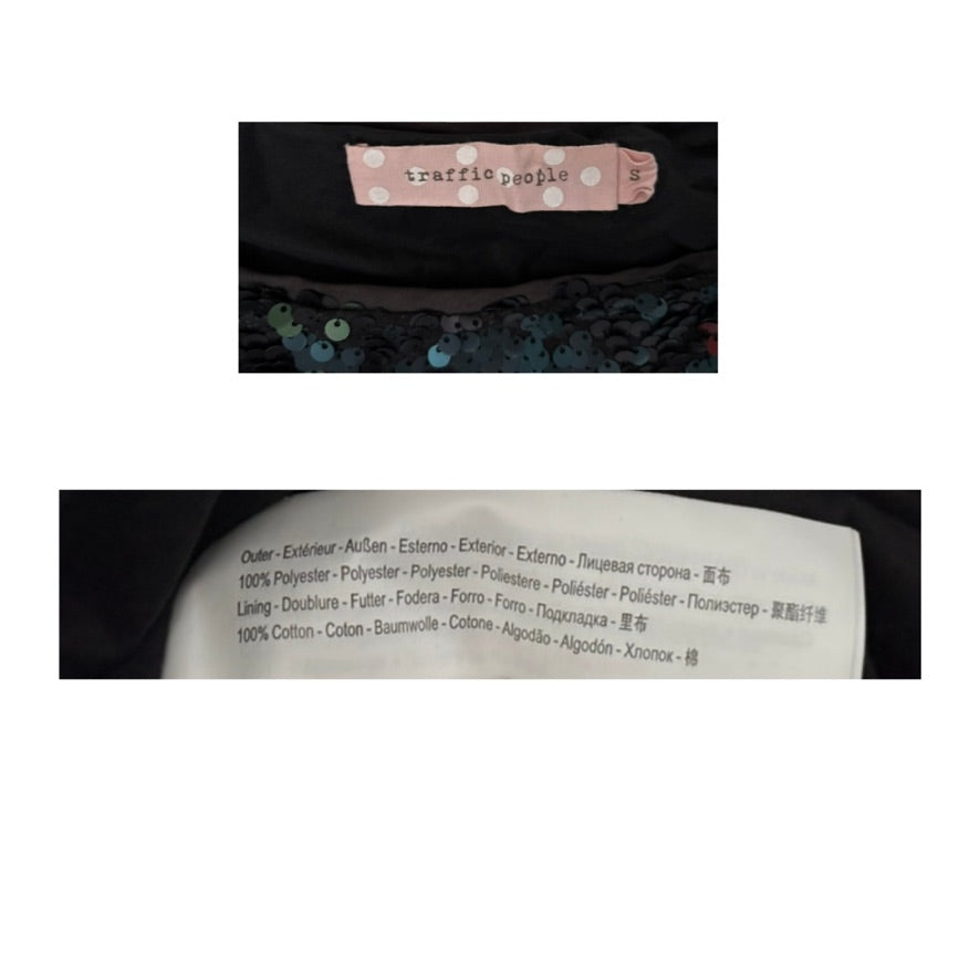 Close-up of a label on a garment with text and a brand name.